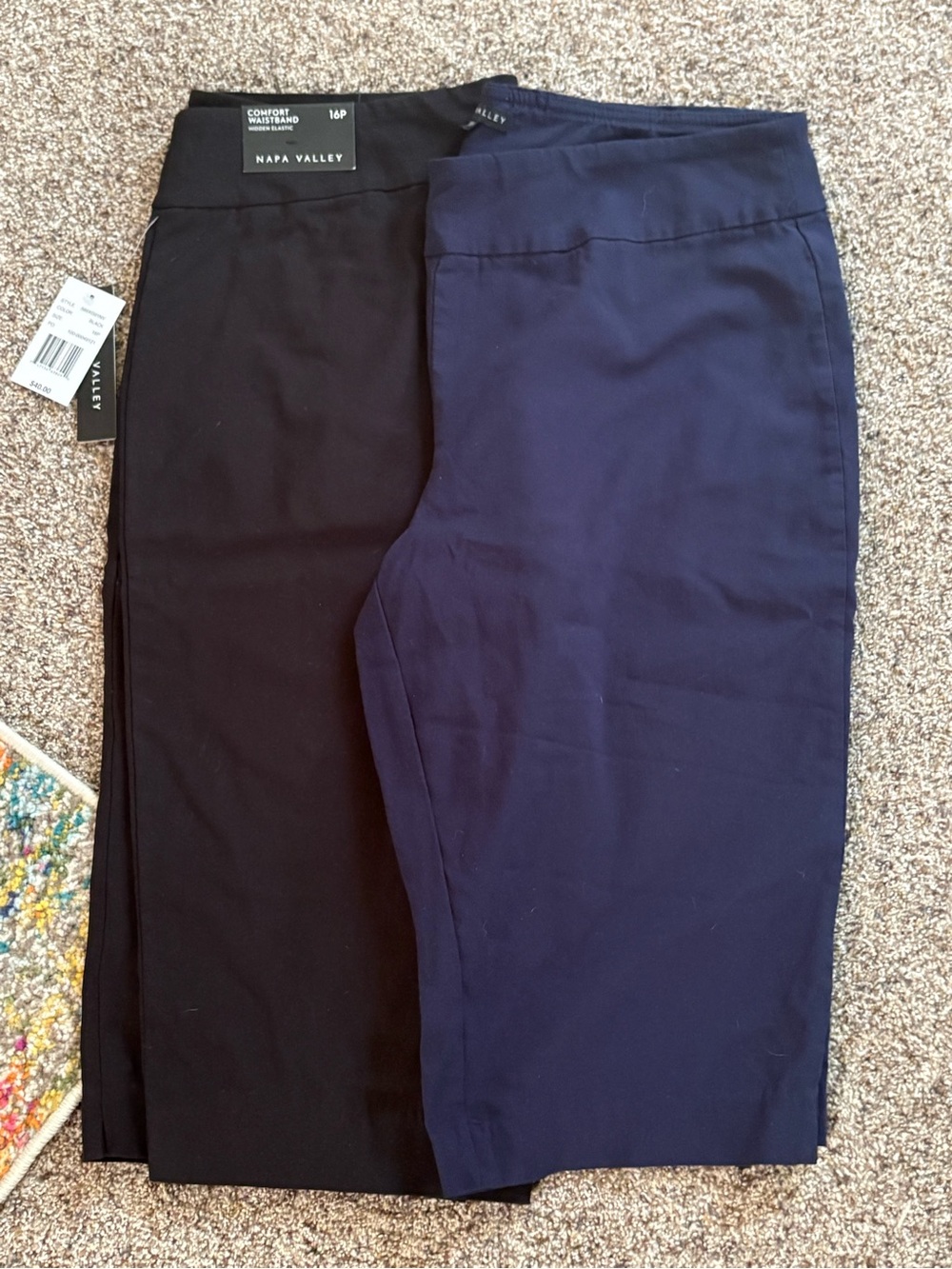 2 pairs of Napa Valley Women's capris. The black pair is new Black and blue 16p